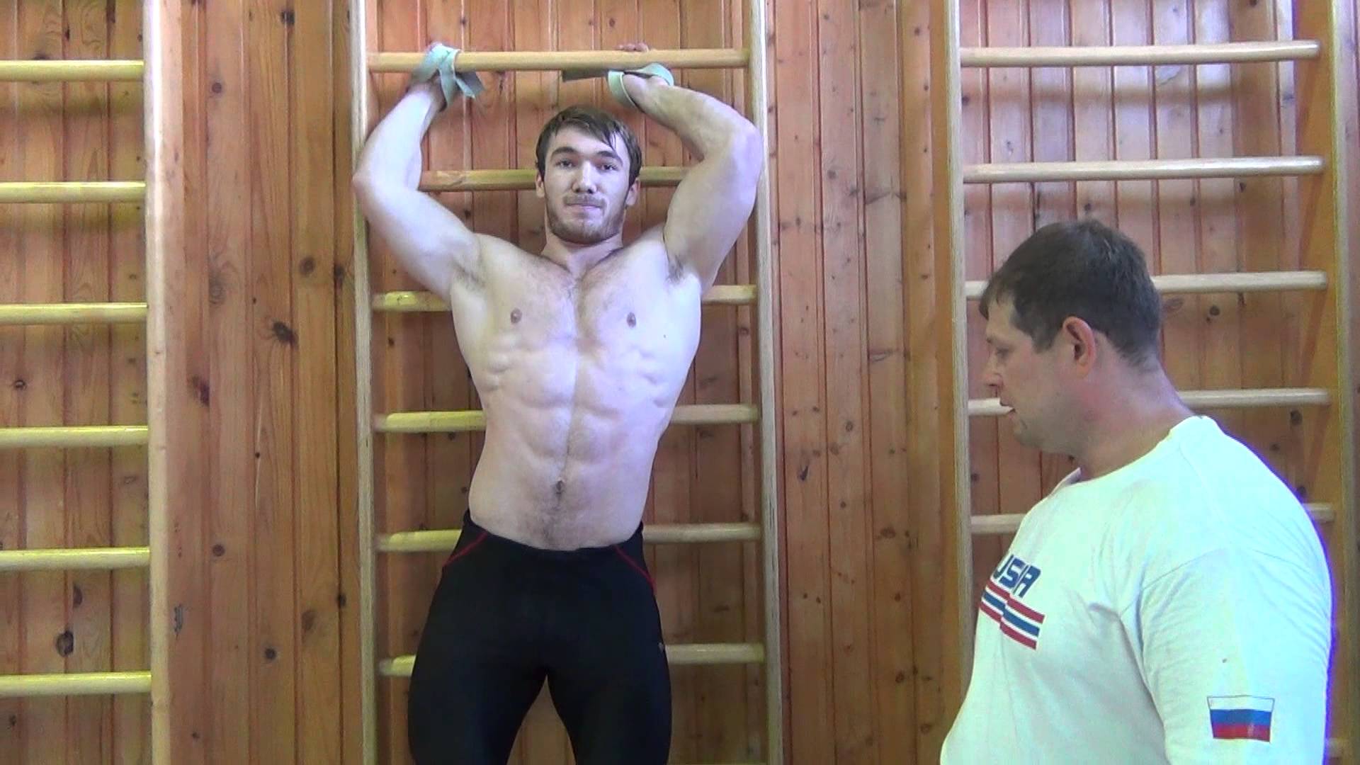 Apti Aukhadov Weighted Hanging Leg Raises with Plate All Things Gym