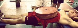 Weighted-Reverse Plank Chinese Weightlifting